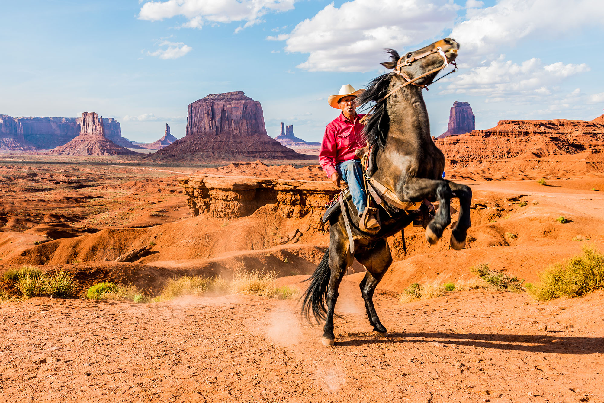 cowboy galluping on horse